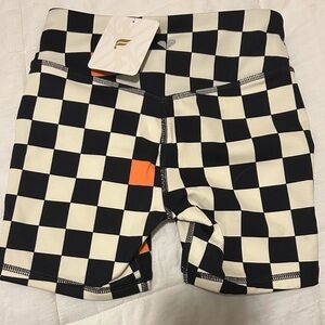 Fabletics Black and White Checkered Bike Shorts with Orange Accent